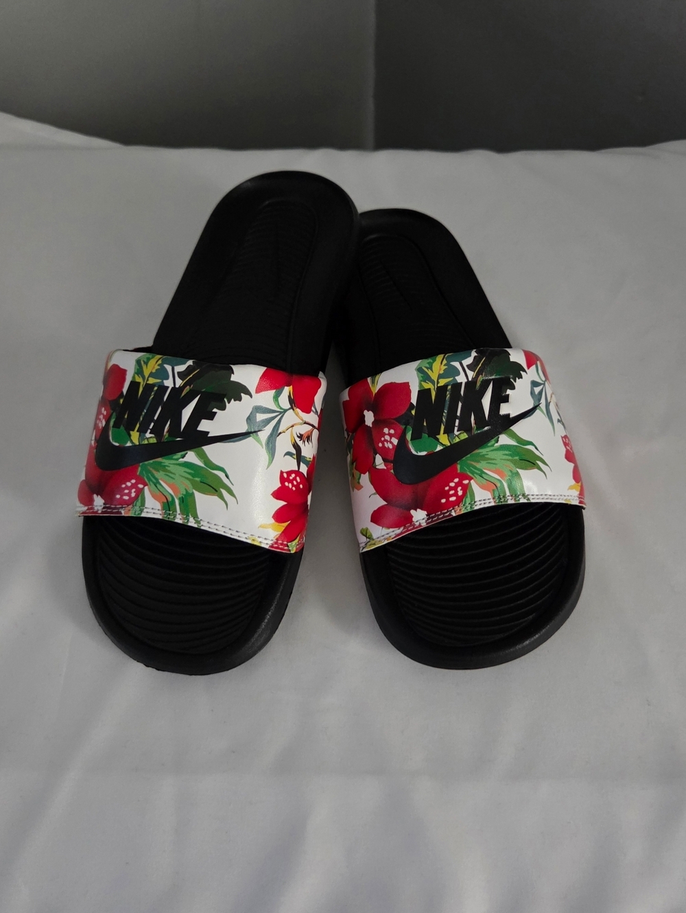 Nike Women's Black Slide Sandals with White Tropical Floral Strap